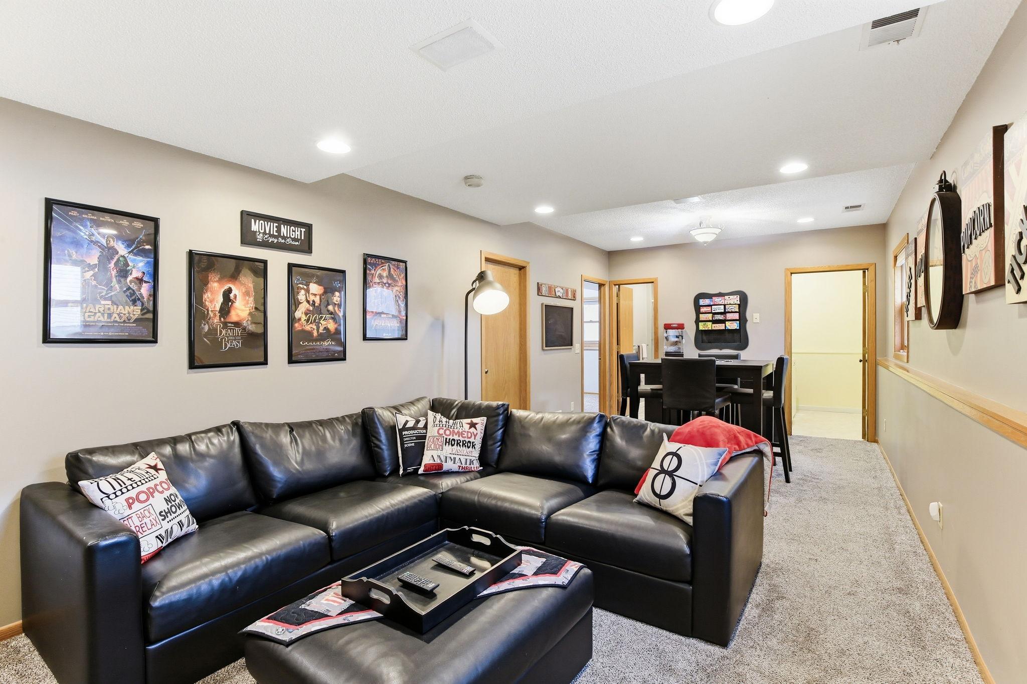 Recessed lighting provides a clean, modern look while delivering even, ambient illumination throughout the space, enhancing both style and functionality without visual clutter.