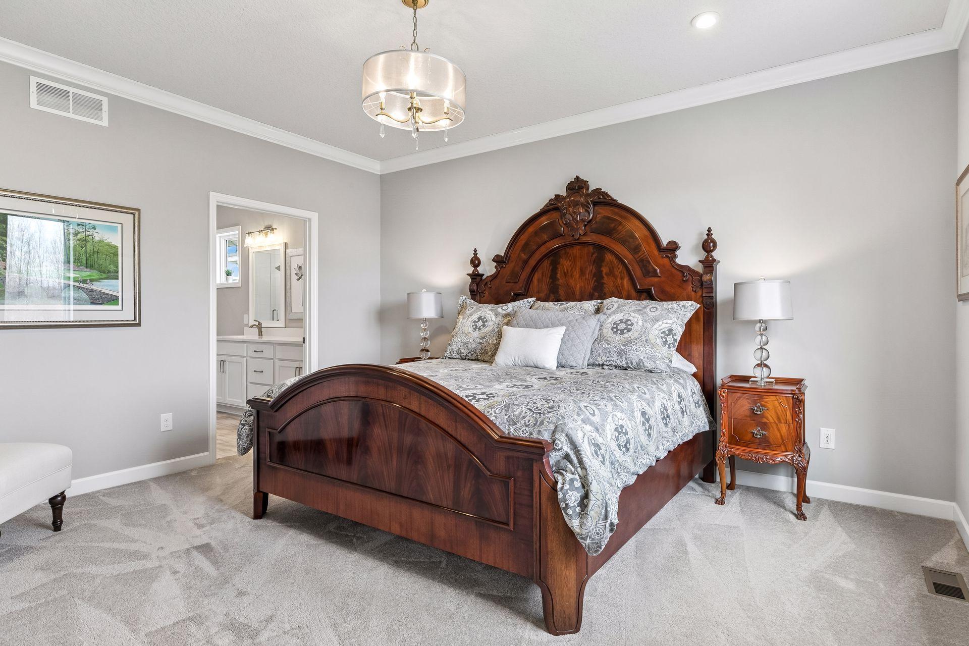 Primary bedroom with plenty of space to accommodate your bedroom furniture. Cove molding adds that special touch. The interior walls of this room and floor are insulated for additional sound reduction.