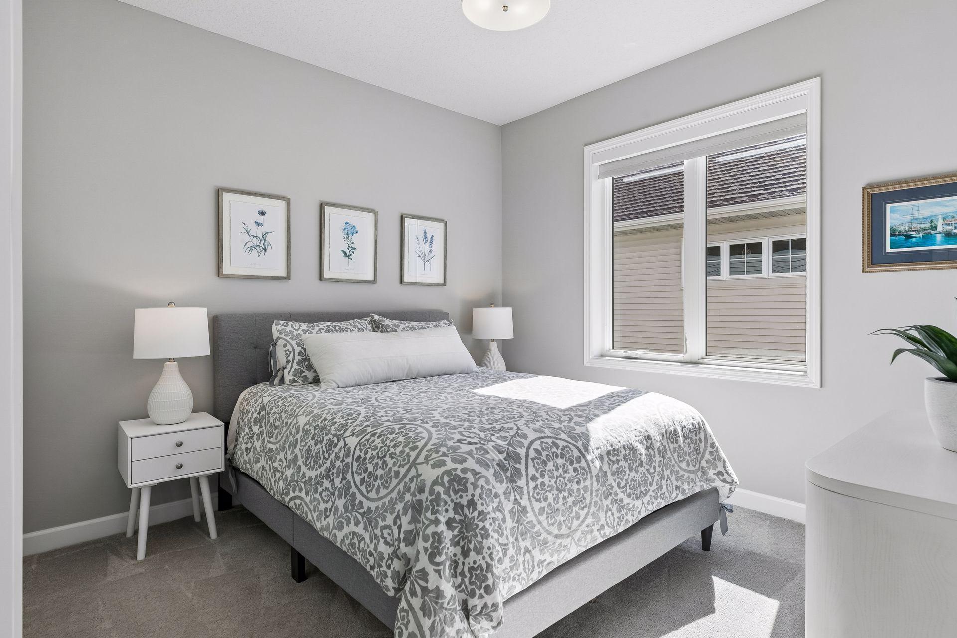 2nd main level bedroom, with large closet and interior walls insulated for addition sound reduction.