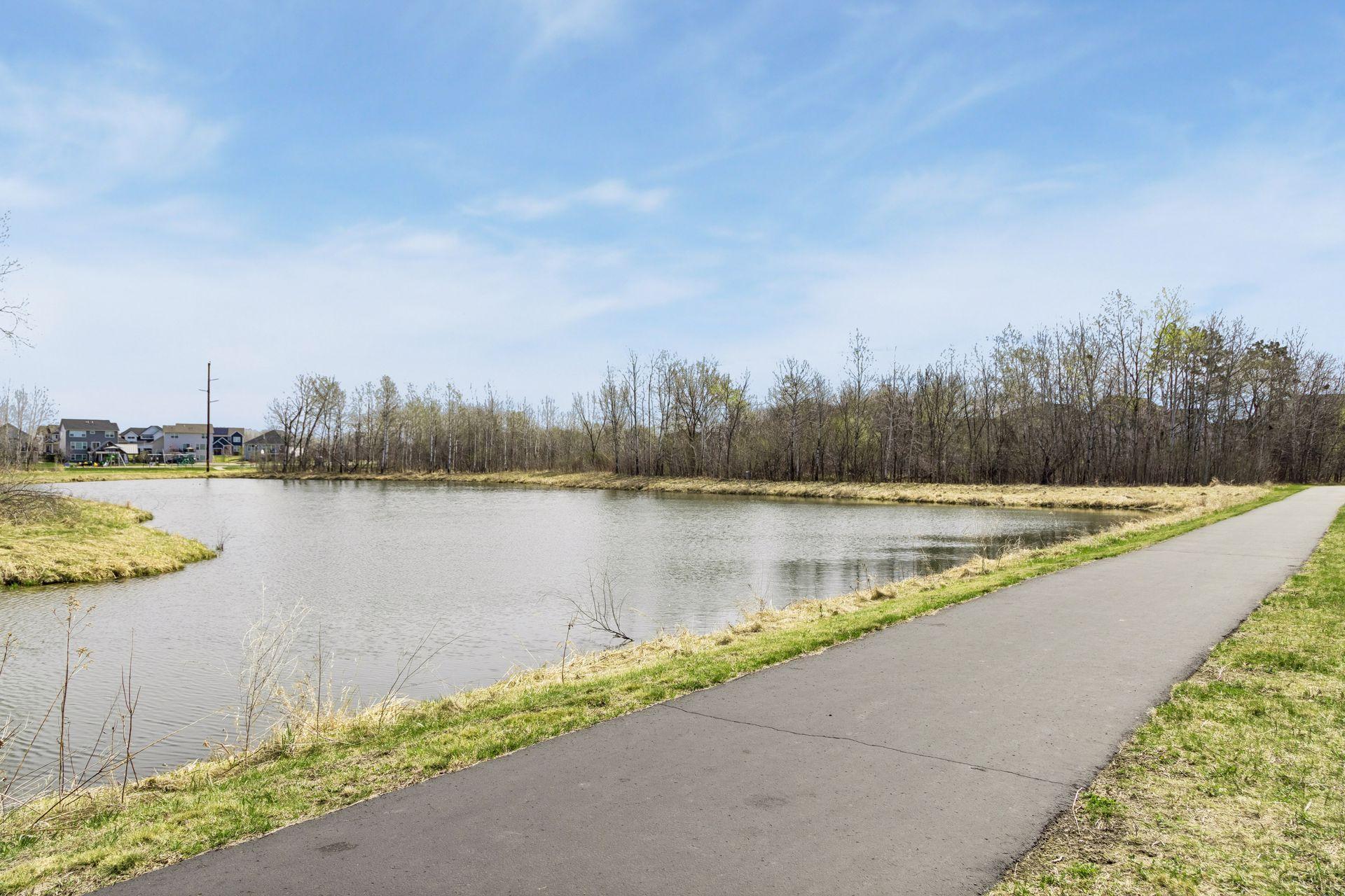 Miles of paved walking trails, just steps from your backyard.