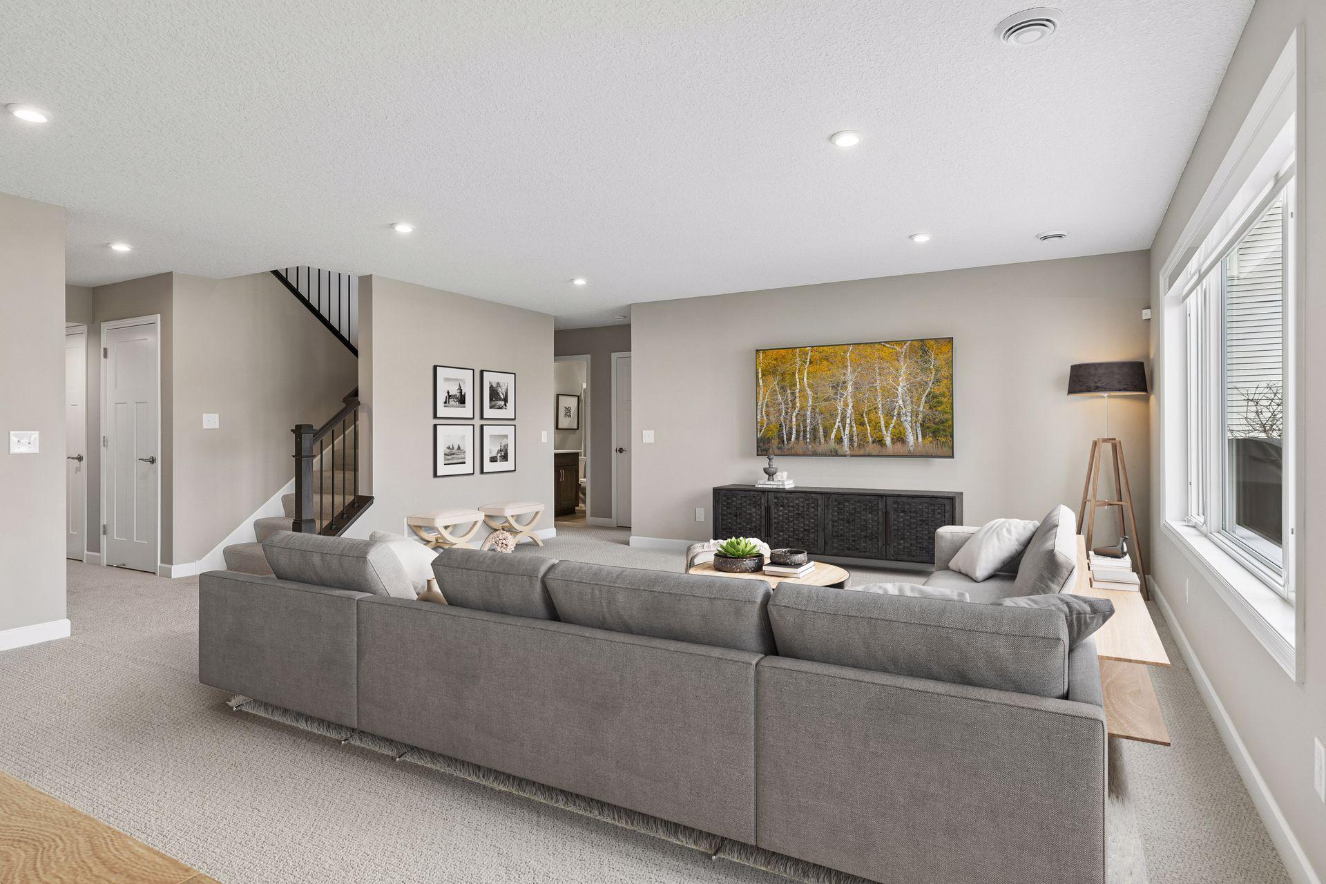 Size of this space can easily accommodate a large sectional or oversized furniture. (Virtual staged in this photo)