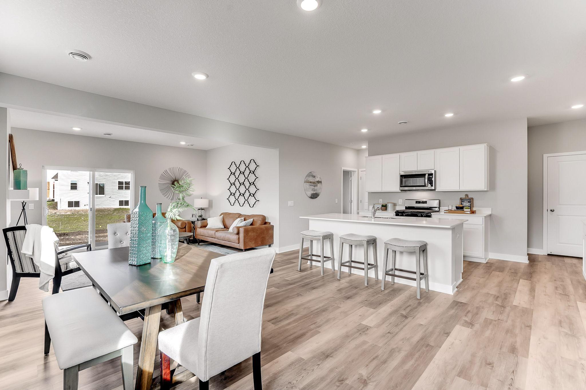 So open and bright! Fantastic for entertaining! *Photo is of a model home.