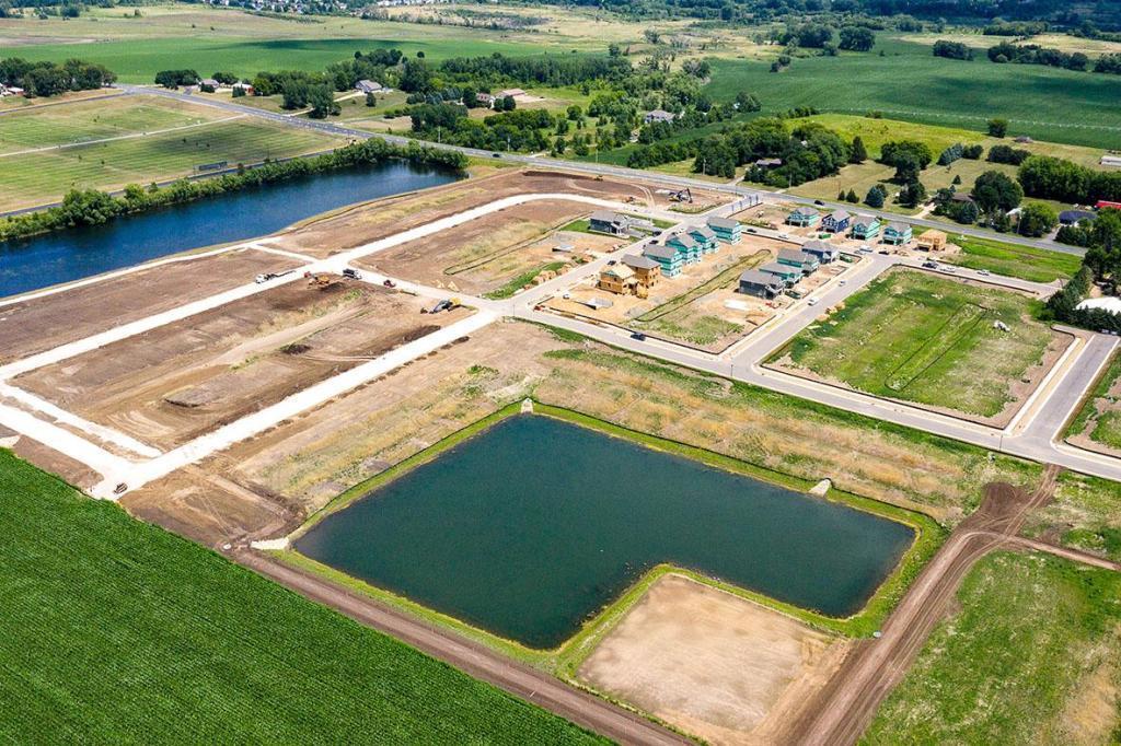 Aerial views of Whispering Fields and the ponds and walking trails throughout the community.