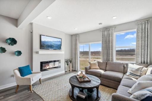 A cozy spot to relax, regardless of the season. *Photo is of a model home!