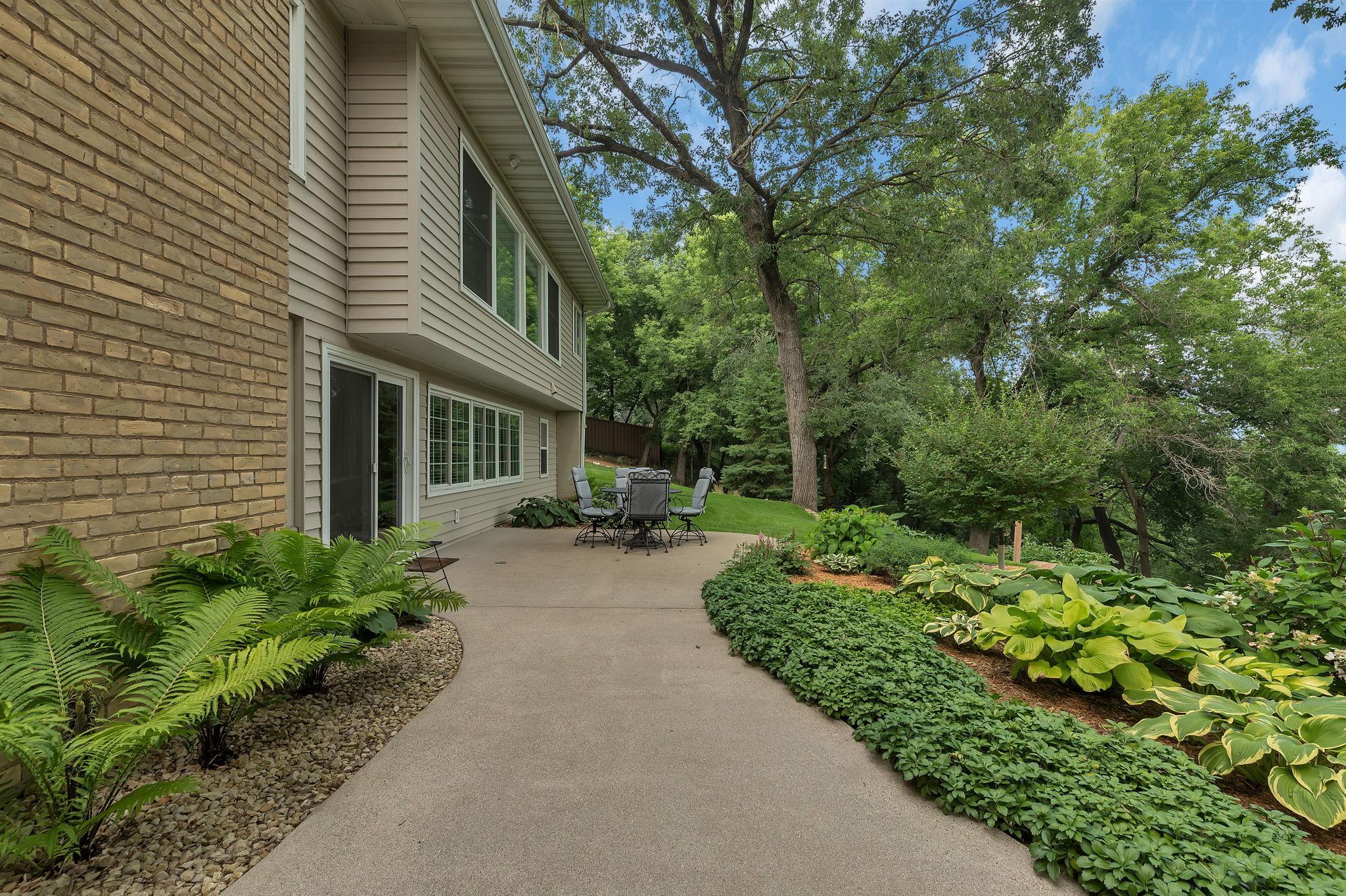 Walk-Out Rambler Leads To An Amazing Private Back Yard Oasis!!