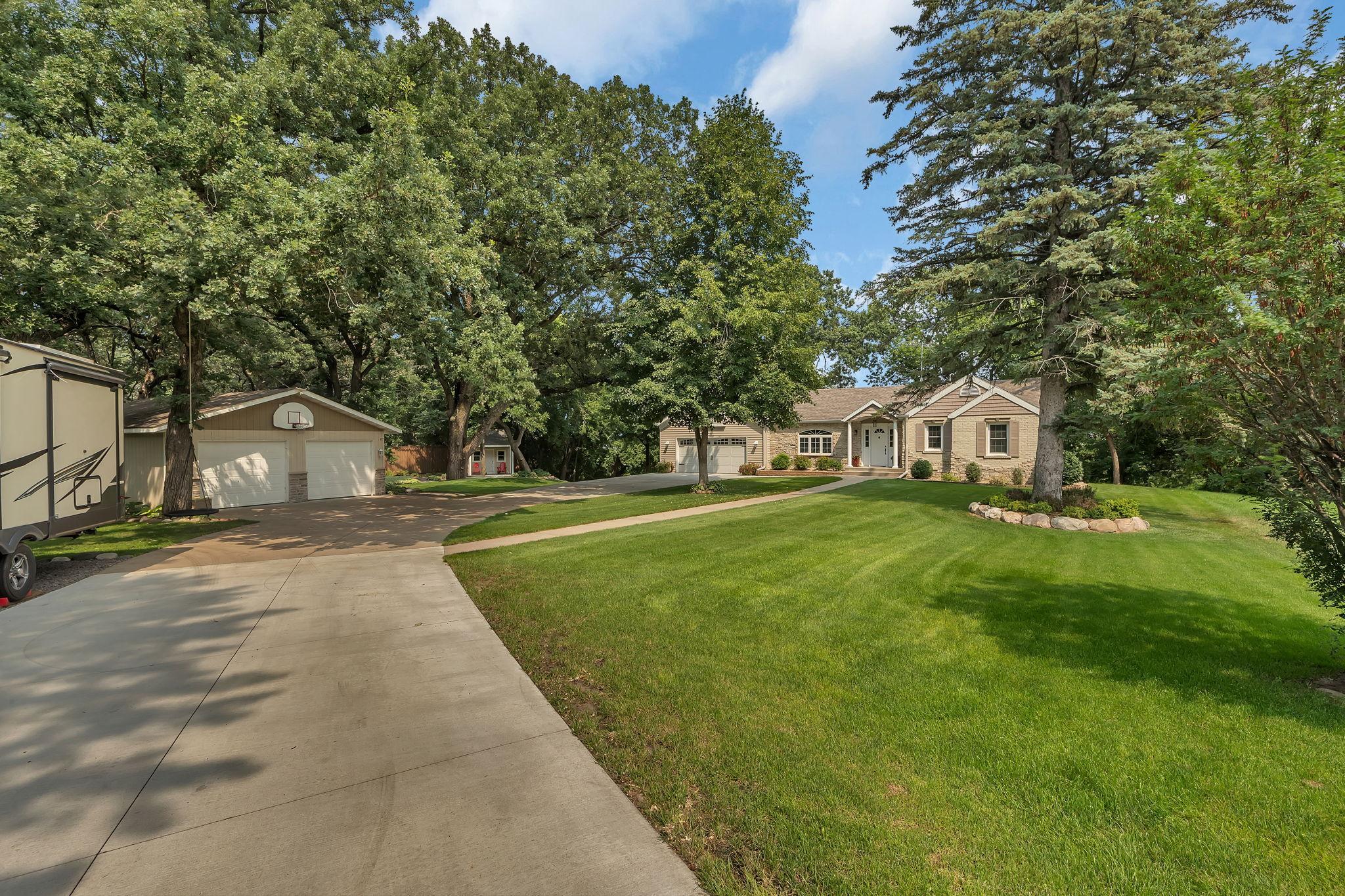 Drive In To Find This Beautiful Rambler With Both Attached And Detached (Heated) Garage!)