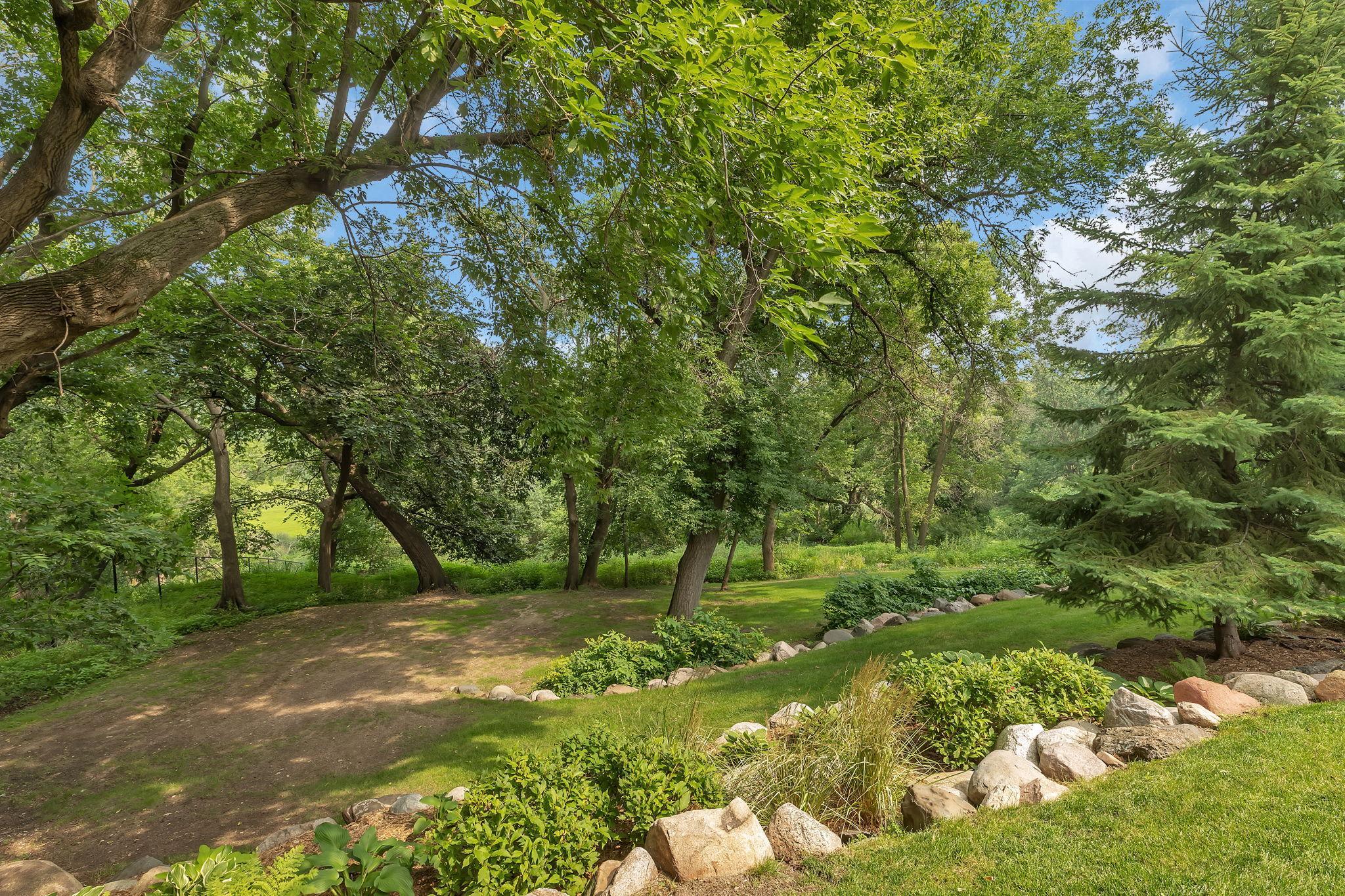 The Canopy Of Trees Unfold Throughout The Property!
