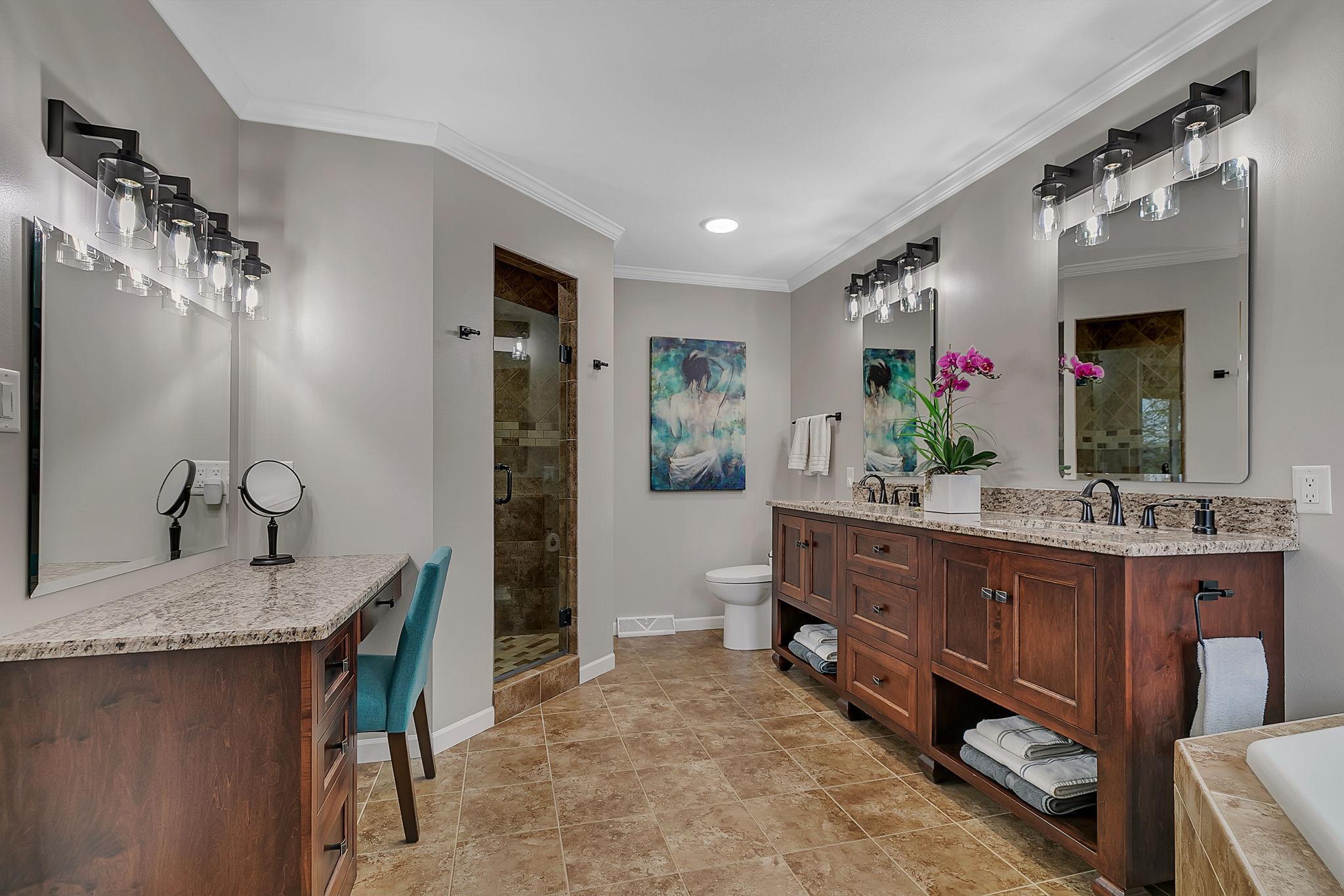 Master Suite Complete With Step In Shower, Whirlpool, Double Sinks And Sitting Area!