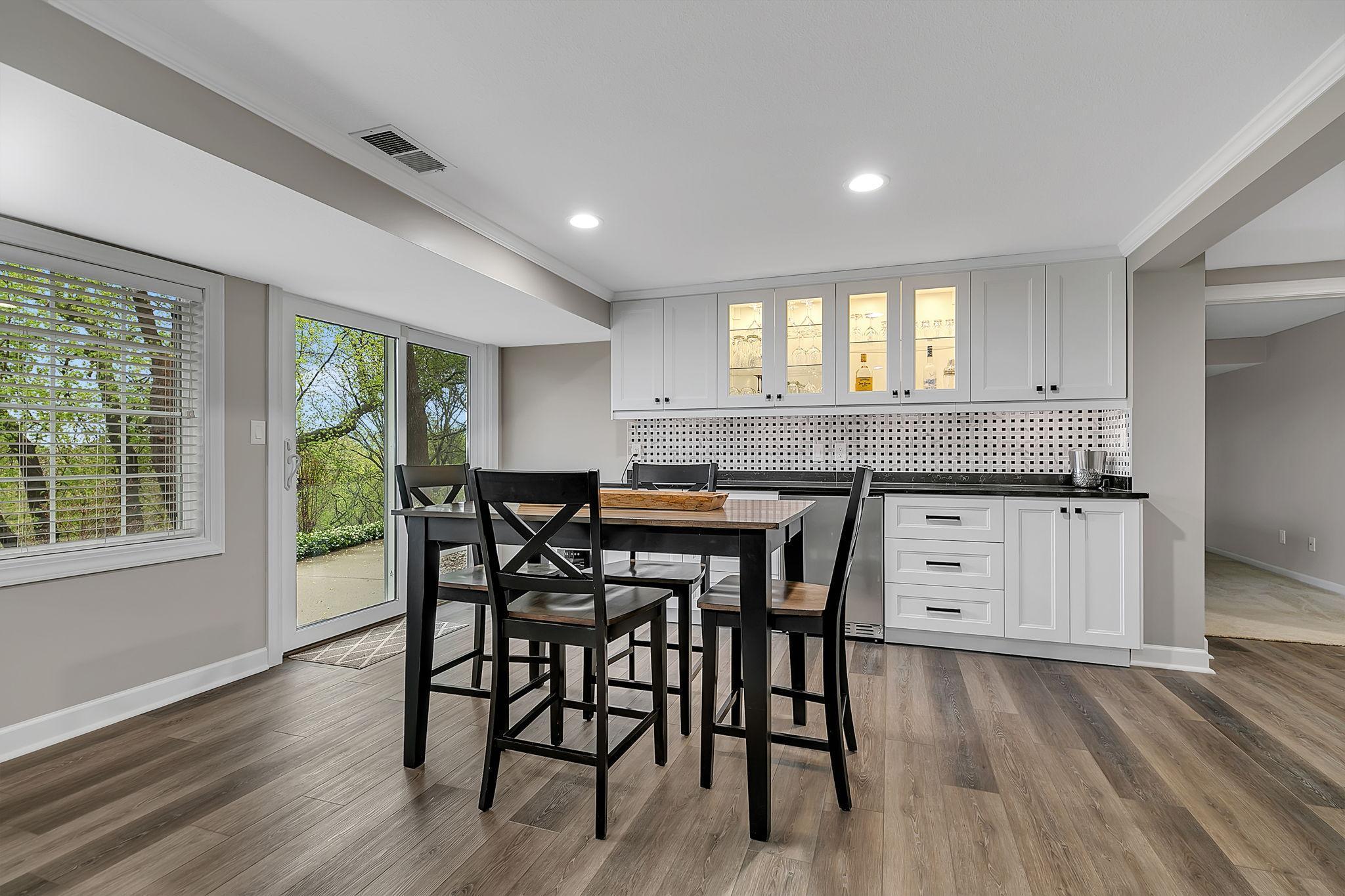 The Beautiful Bar Area Provides A Seamless Indoor-Outdoor Transition, Stepping Out To The Patio And A Backyard Oasis That Is Perfect For Summer Entertaining!