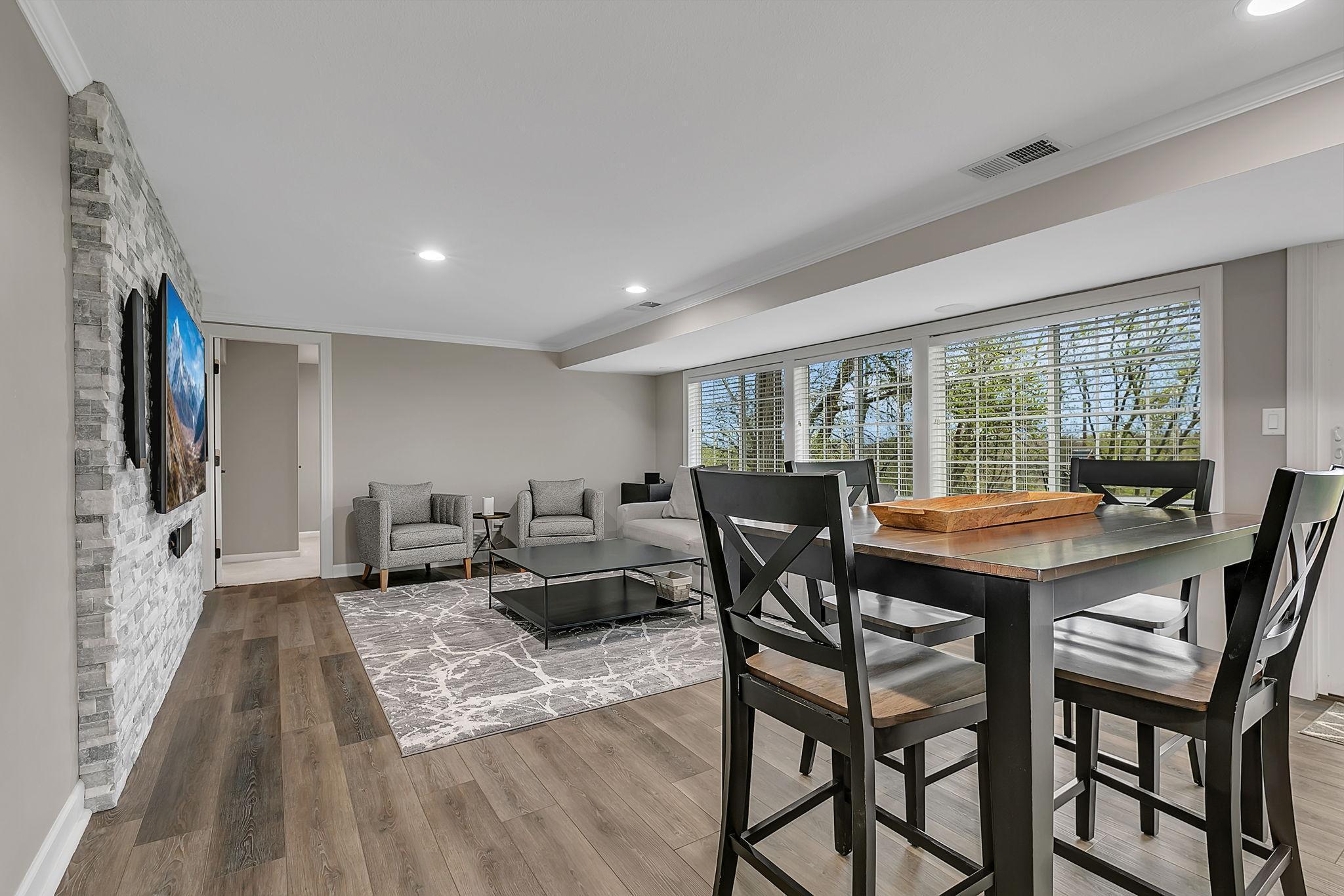 Lovely Lower Level Walk Out Family Gathering Area!!