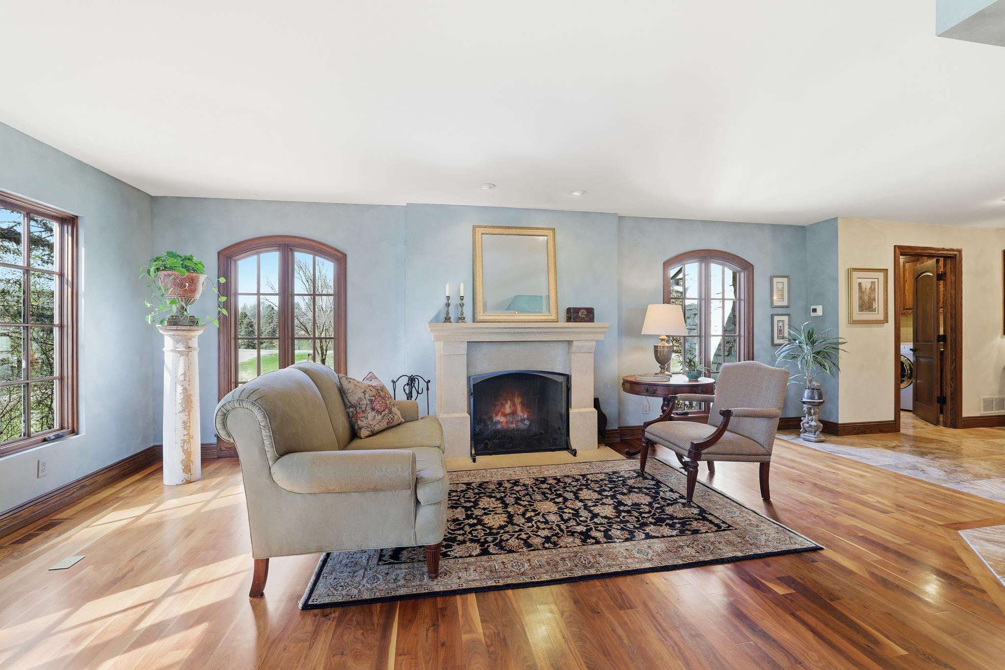 Formal living area with wood fireplace