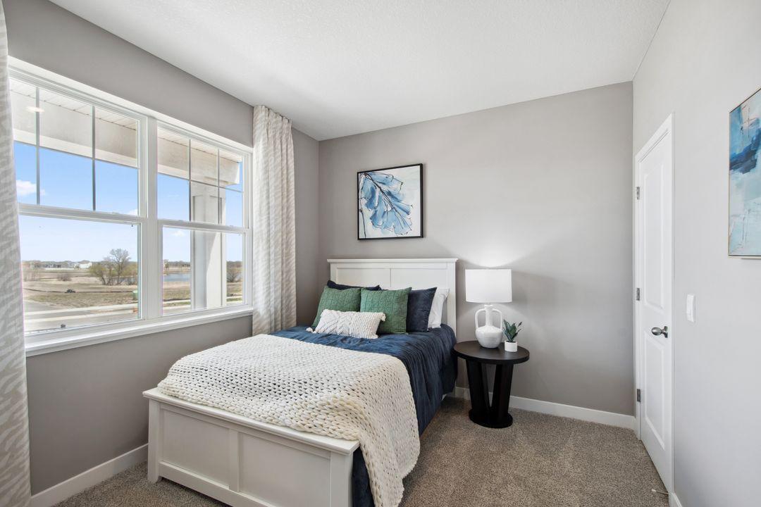 Highly sought-after main level bedroom with walk-in closet, adjacent to a full bathroom!
