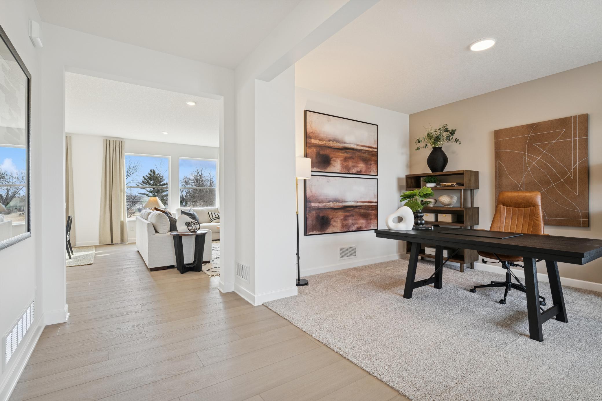 (*Photo of actual model) This home offers a spacious flex space located at the front of the home - perfect for an at home office