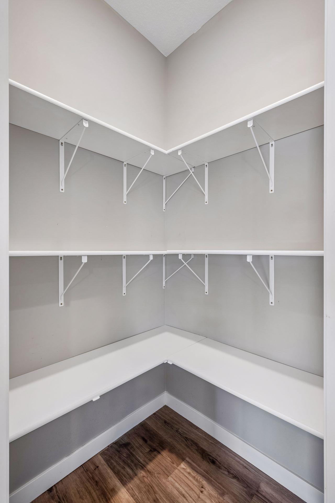 Large corner pantry with tons of shelving!