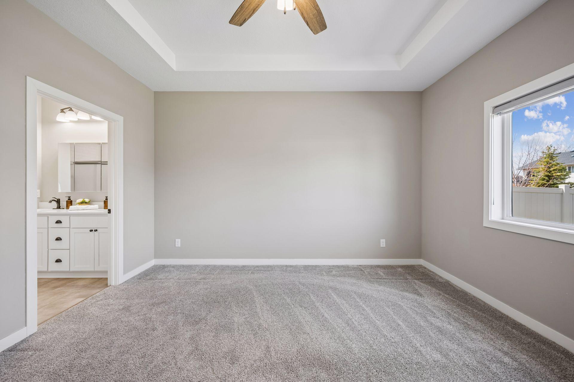 Primary ensuite and large window.