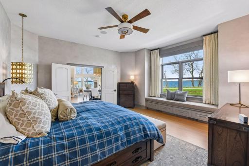 Primary suite wake up to these lake views
