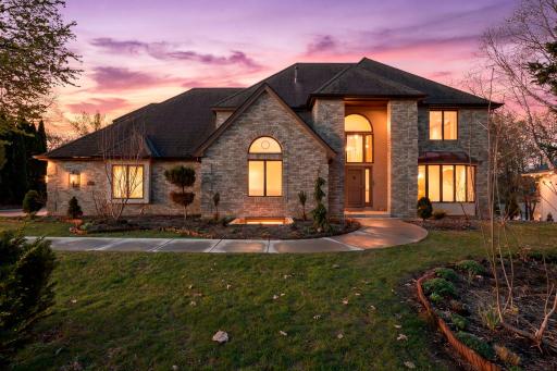 Experience refined lakefront living in this exceptional 5-bedroom, 4-bath residence, ideally tucked into a peaceful cul-de-sac on Red Rock Lake in the heart of Eden Prairie.