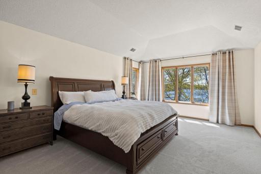 French doors open into a truly remarkable primary suite.