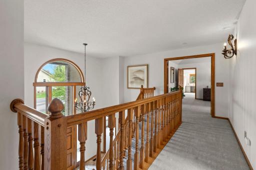Upstairs, brand new carpet and fresh paint throughout the entire level create a comfortable, move-in-ready feel.