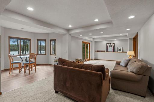 Host in the spacious family room with backyard access. Every space is designed for comfort and versatility.
