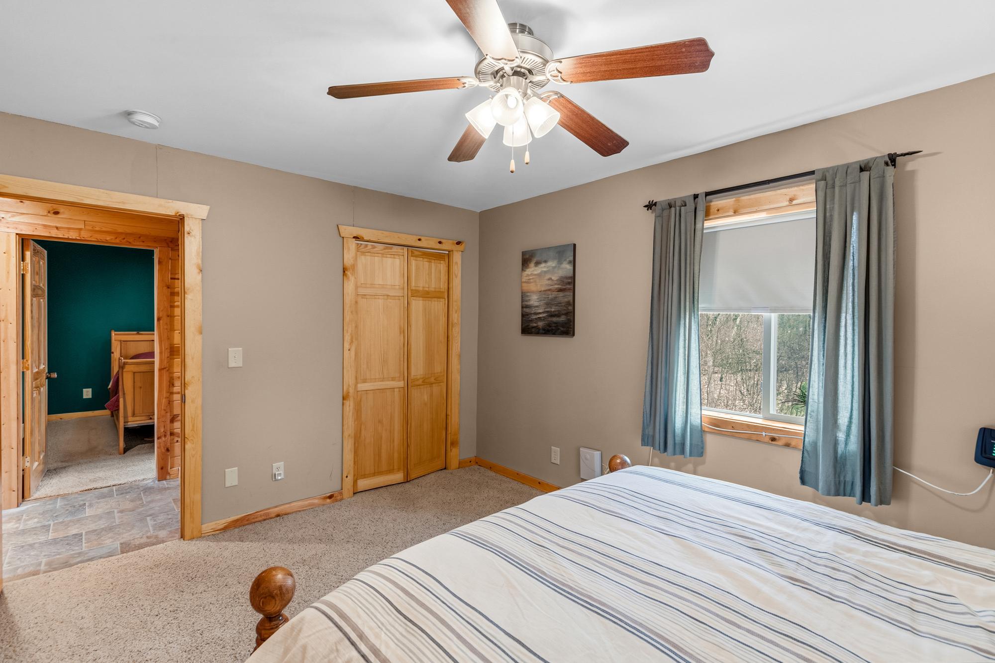 View of the other side of the primary bedroom. The window is west facing.