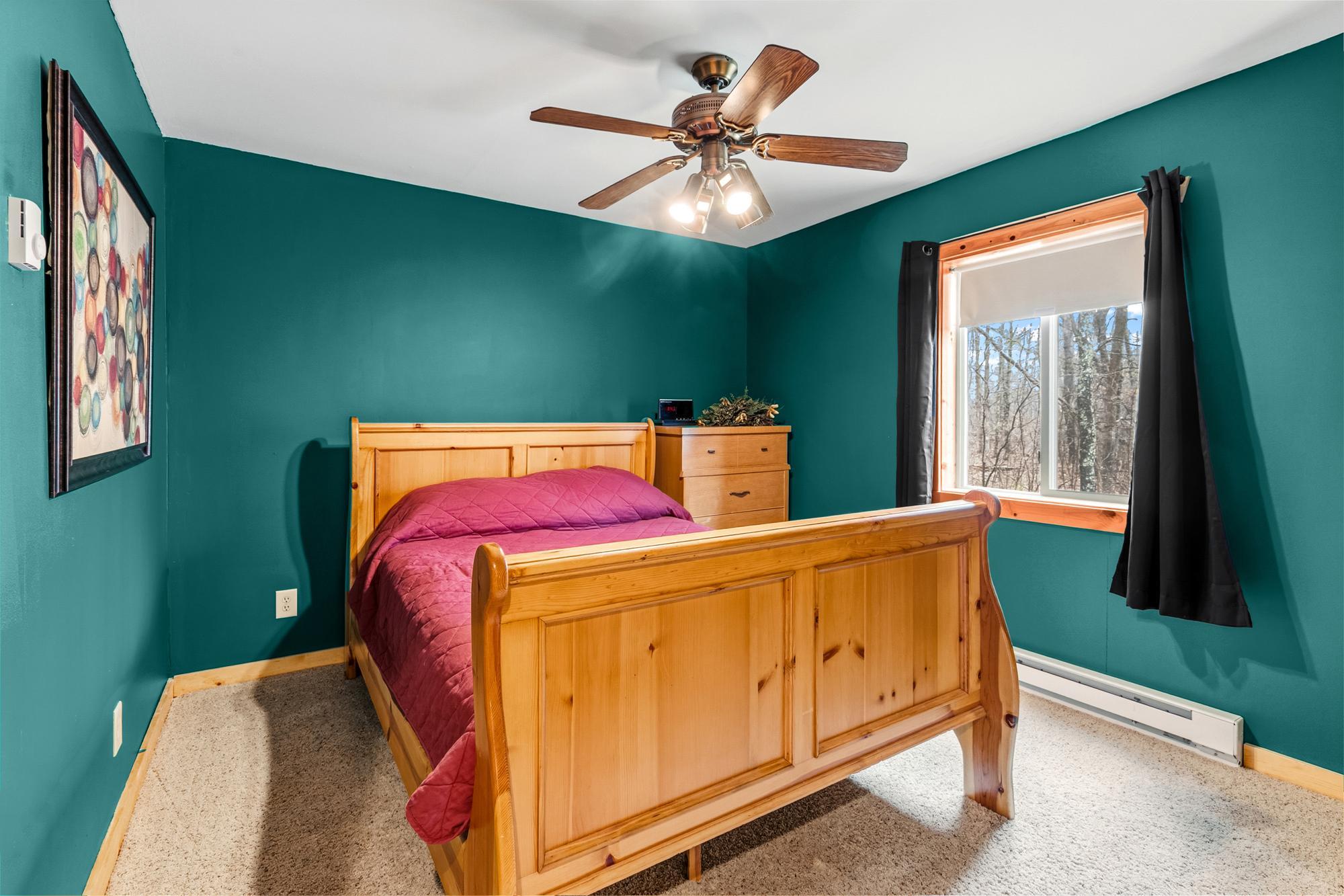 Bedroom #2 also has an electric baseboard, ceiling fan and west facing window.