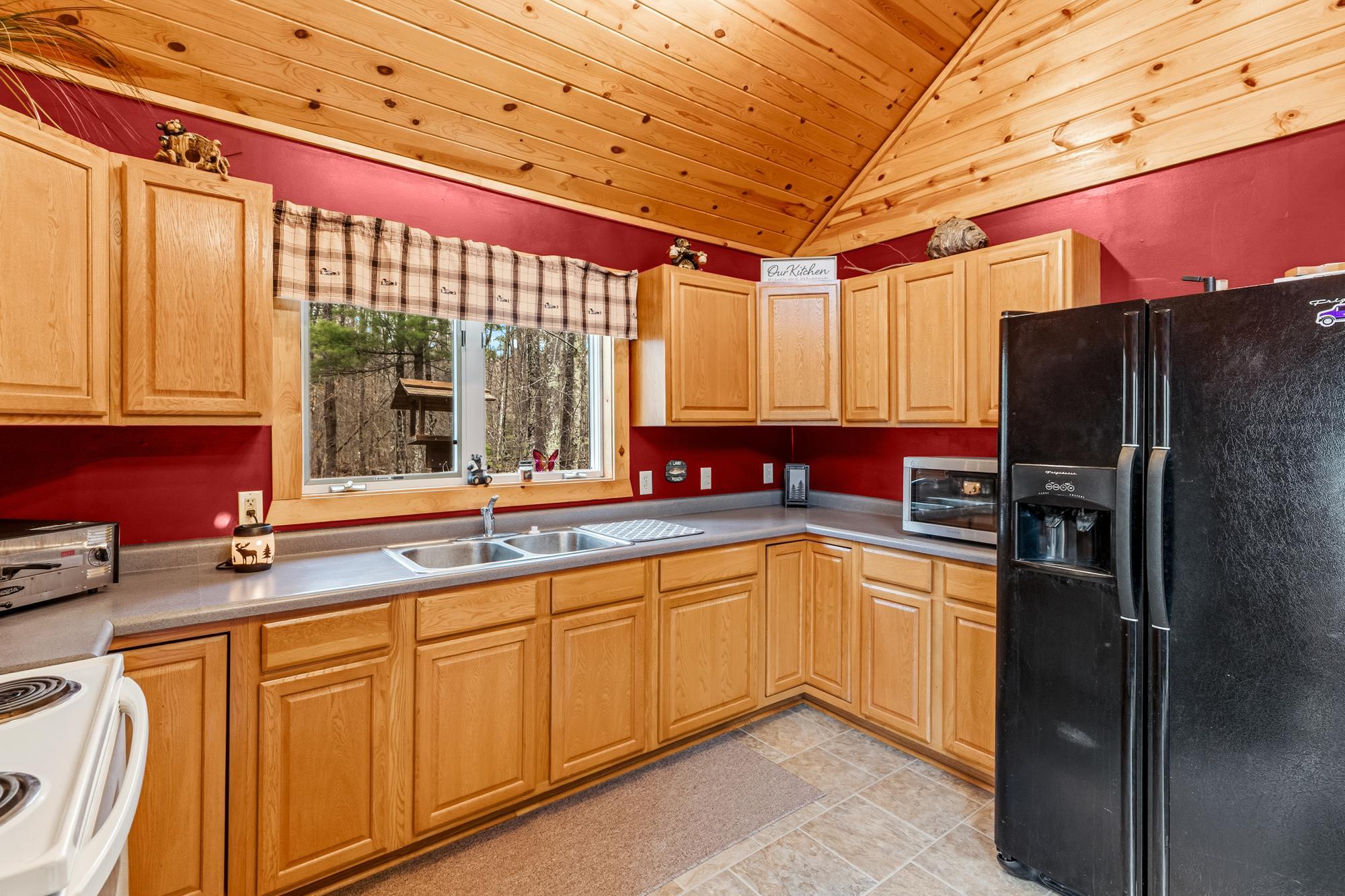 Check out the size of that kitchen window! Imagine yourself doing the dishes and watching the wildlife outside at the same time.