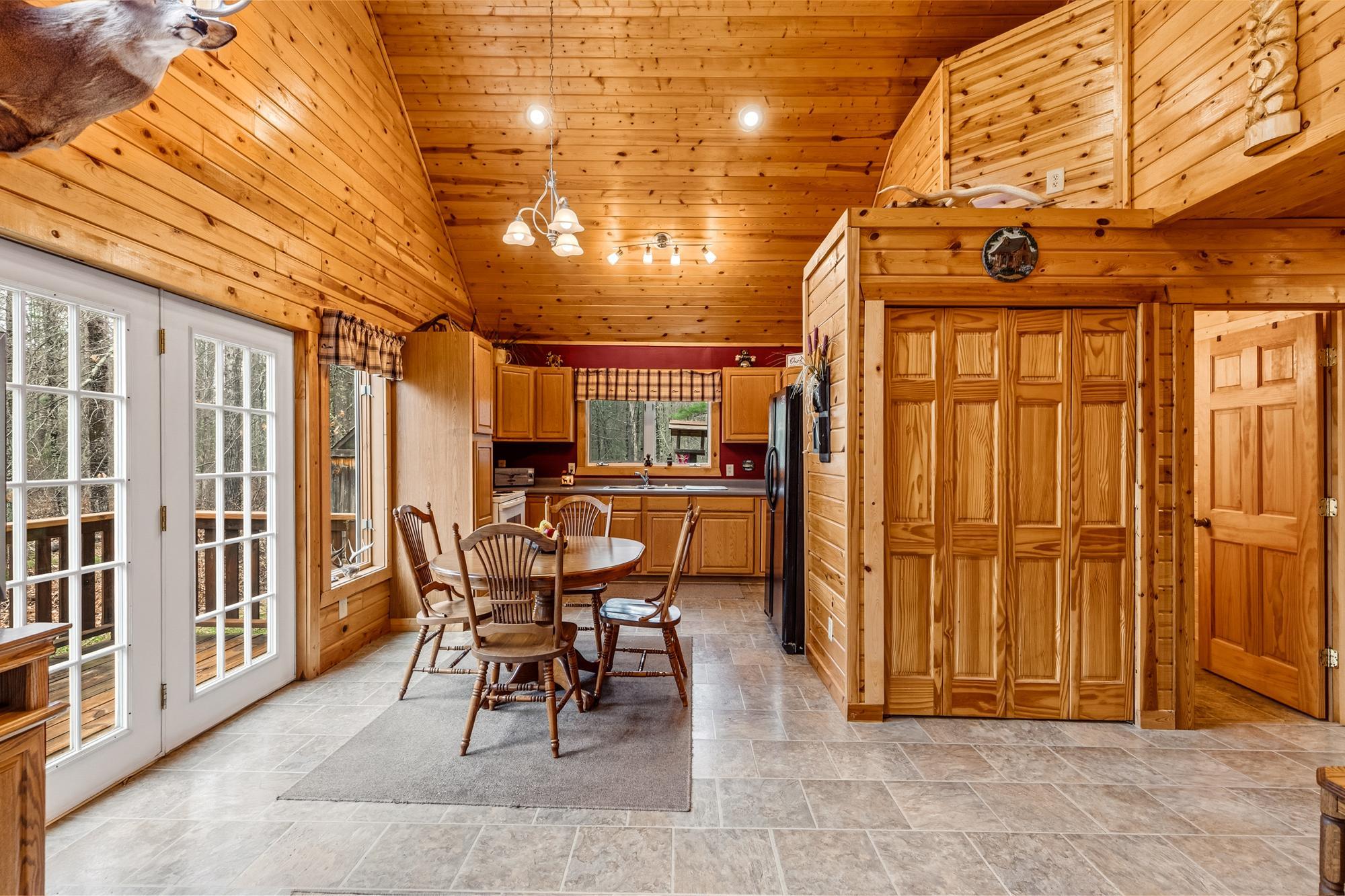 The closet to the right, between the kitchen and bathroom, is where a stackable washer & dryer could be, with the addition of a "on demand" water heater. There is a drain pipe for the washer & an outlet for the dryer.