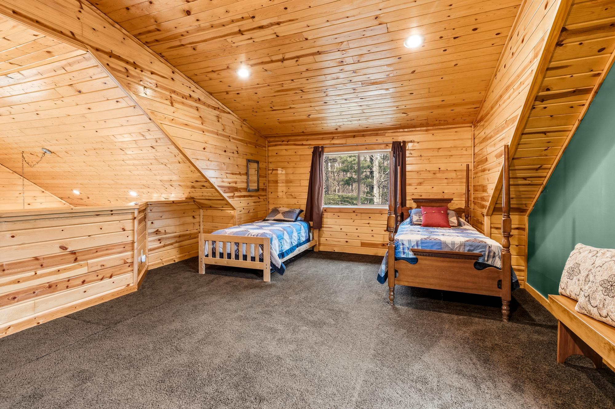 There is plenty of room for bunk beds or larger beds in the loft space.