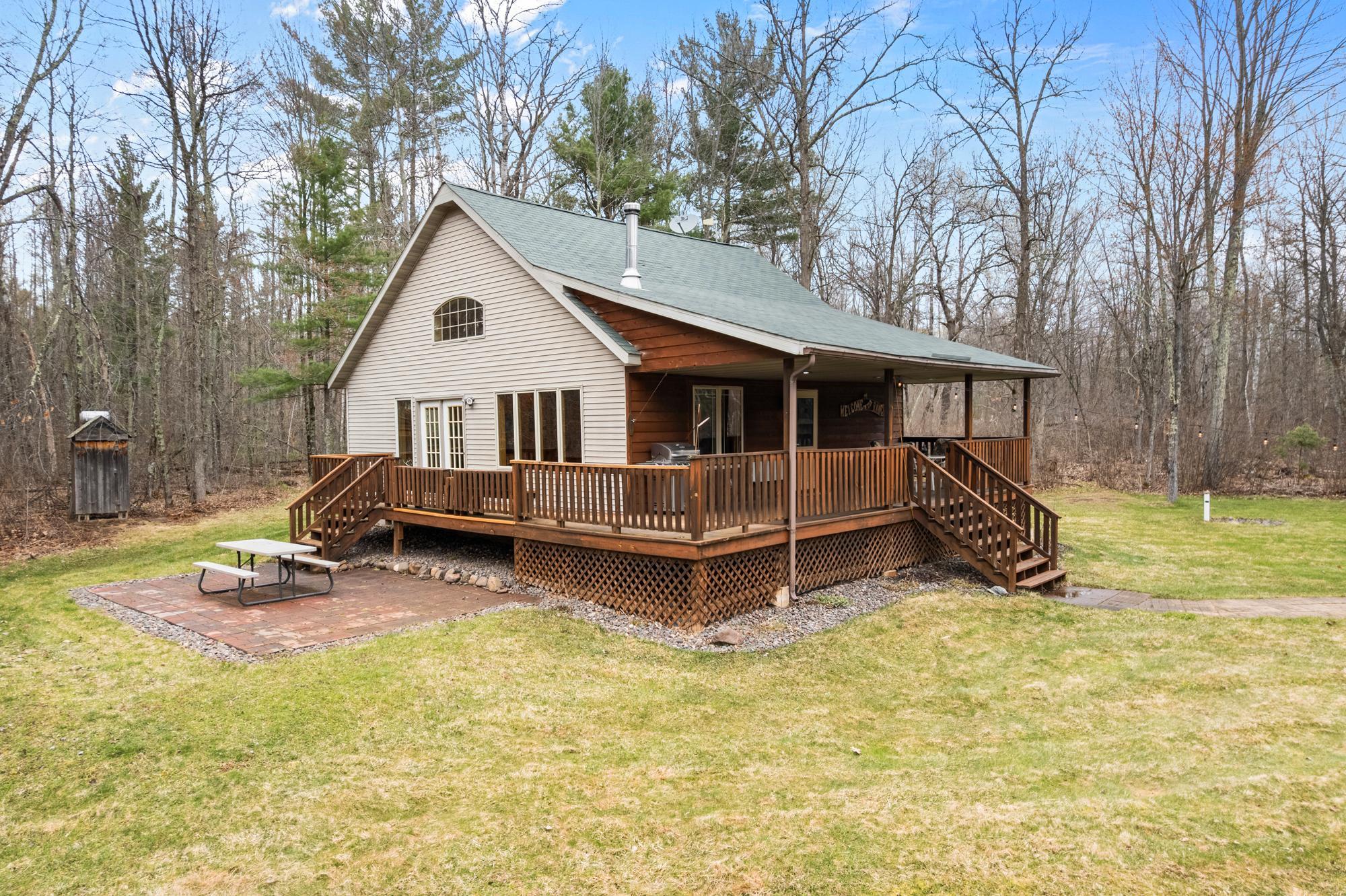 Cedar siding on the front and vinyl on all other sides. 20 X 13 paver patio for your BBQ's and gatherings.