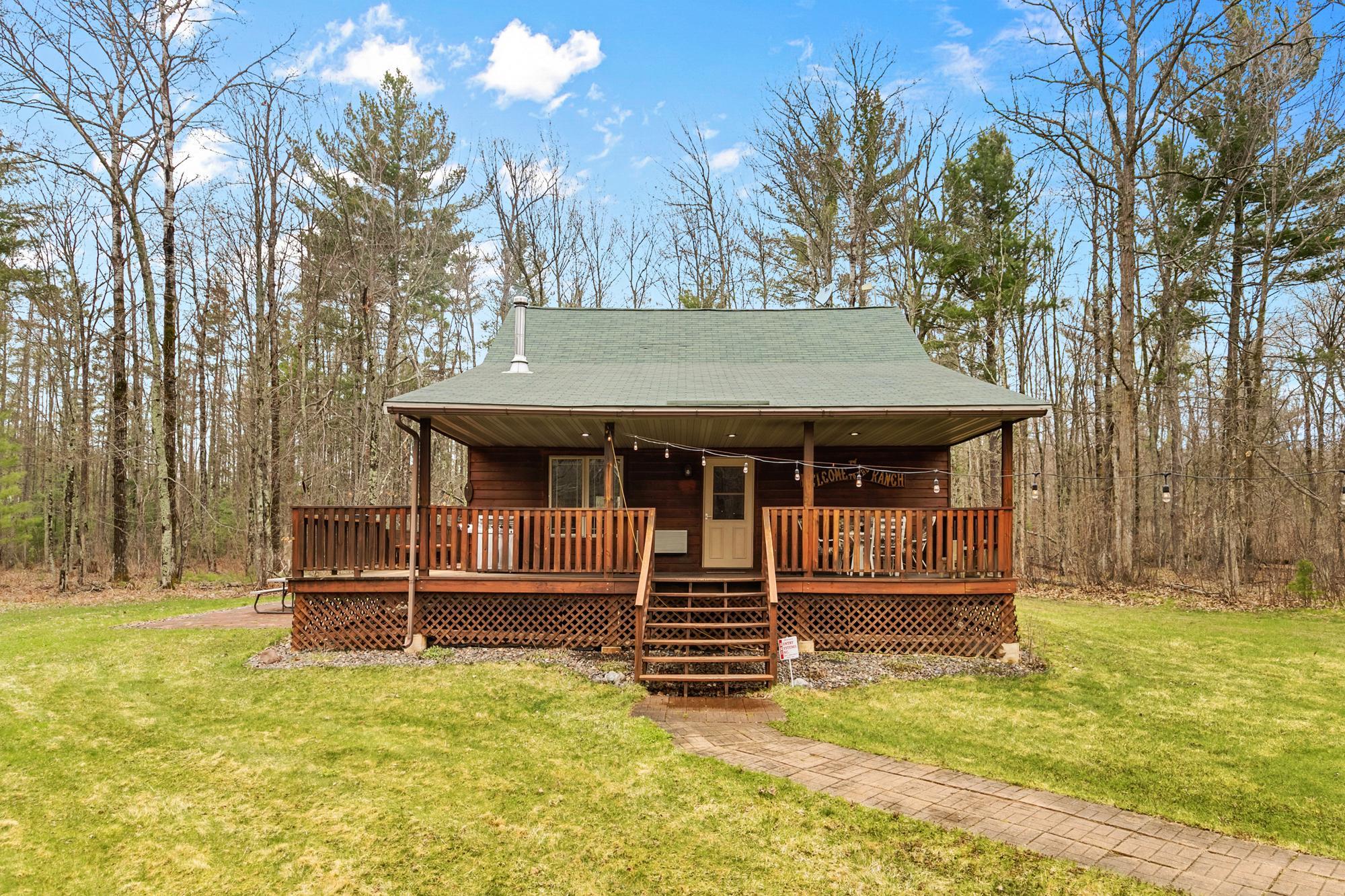 Wrap around deck on the south & east sides with the roof covering the front.