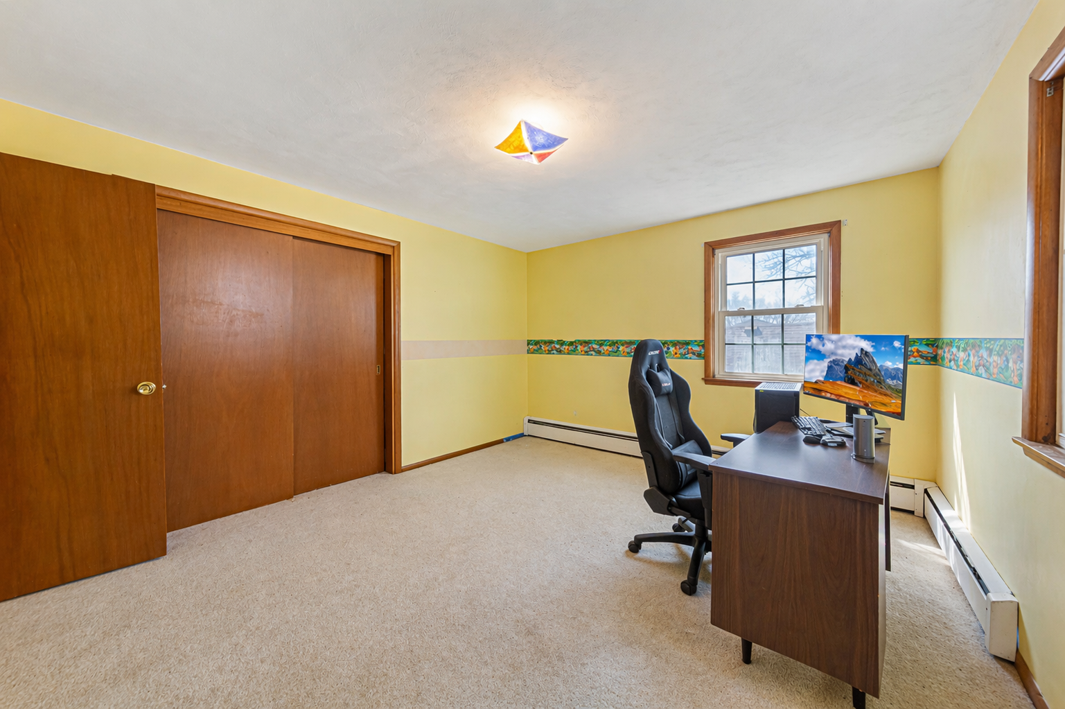 Bedroom 3 - This photo has been AI edited to remove personal property and clutter for marketing purposes. Actual property condition may vary.