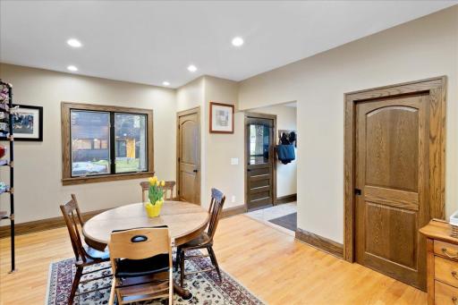 Cozy informal dining space perfectly positioned off the kitchen, offering easy access and great sightlines for hosting.