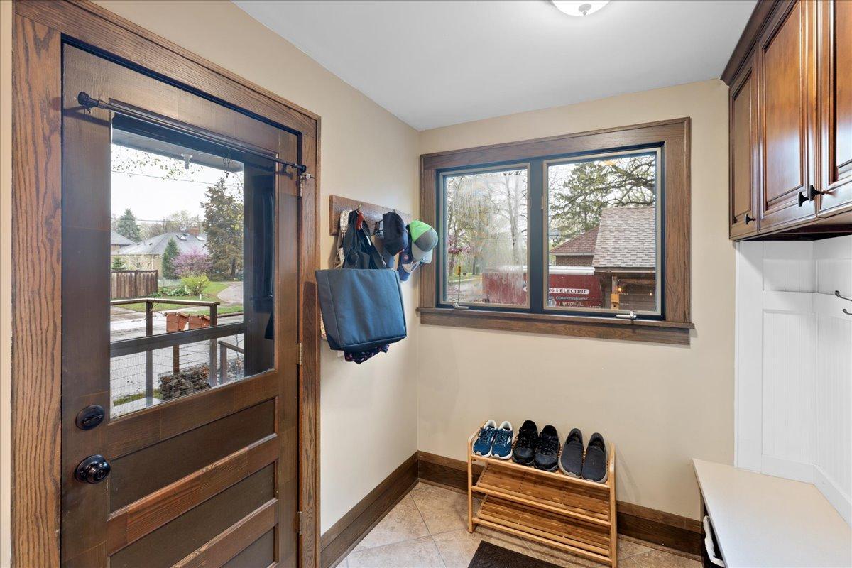 Back door leading out to patio and garage