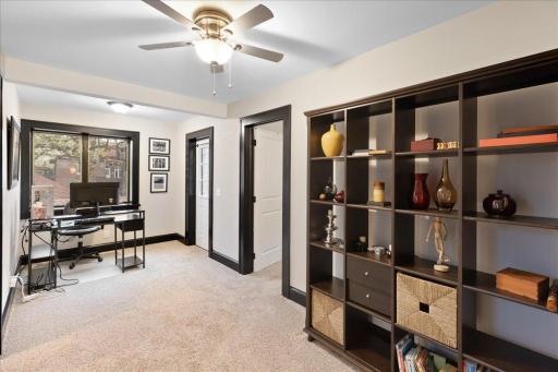 Spacious upper-level landing offers a versatile flex spaceâperfect for a home office, study area, or additional lounge.