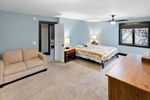 Spacious upper-level primary suite featuring generous proportions and a comfortable layout.
