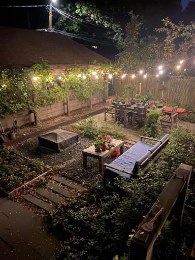 Stunning backyard ambiance with string lightingâperfect for evening entertaining and relaxing under the lights.