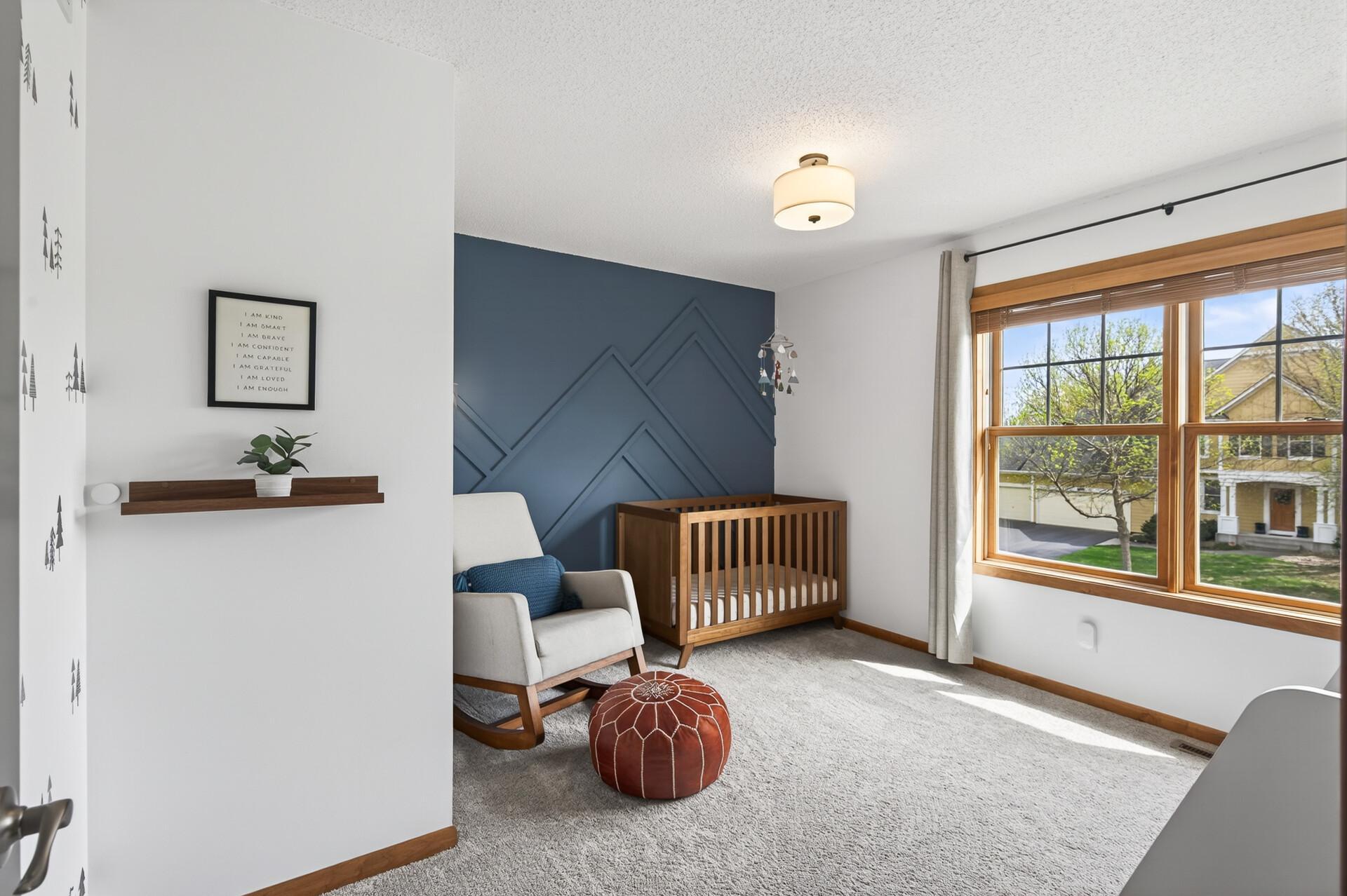 Upper-level bedrooms designed for comfort with ample space and natural light throughout.