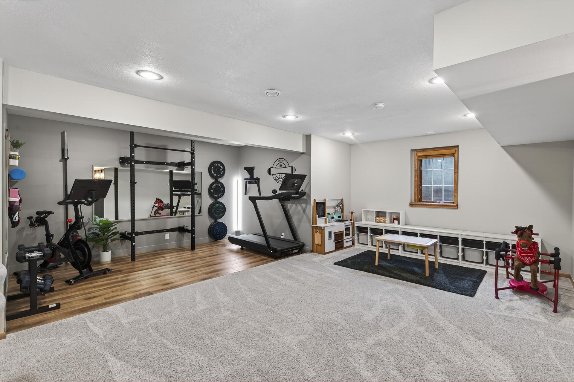 Dedicated flex space perfect for a home gym, playroom, or hobby area.
