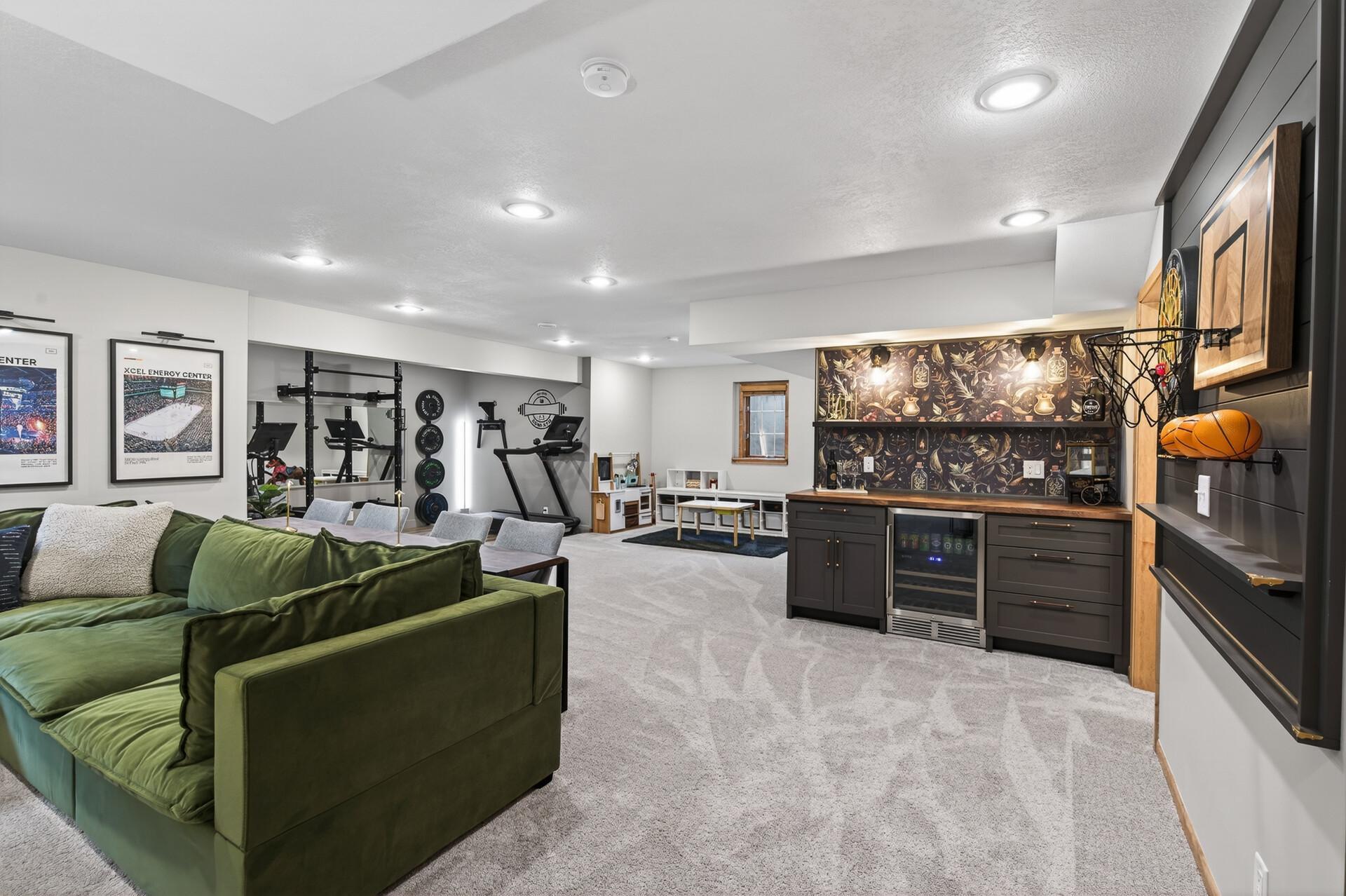 Thoughtfully designed lower-level bar space ideal for gatherings and everyday enjoyment.