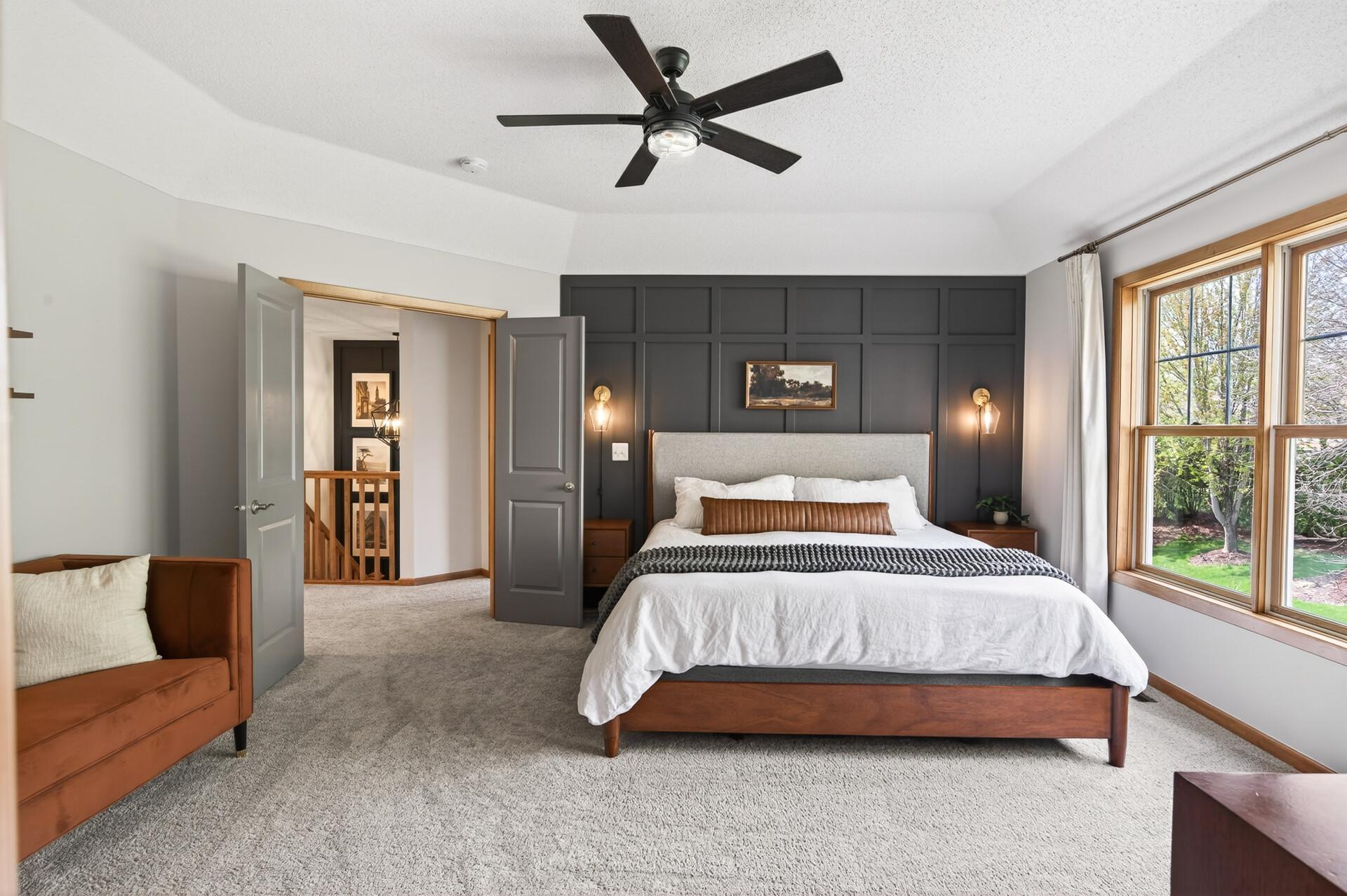 Light-filled primary bedroom offering generous space and a comfortable retreat feel.