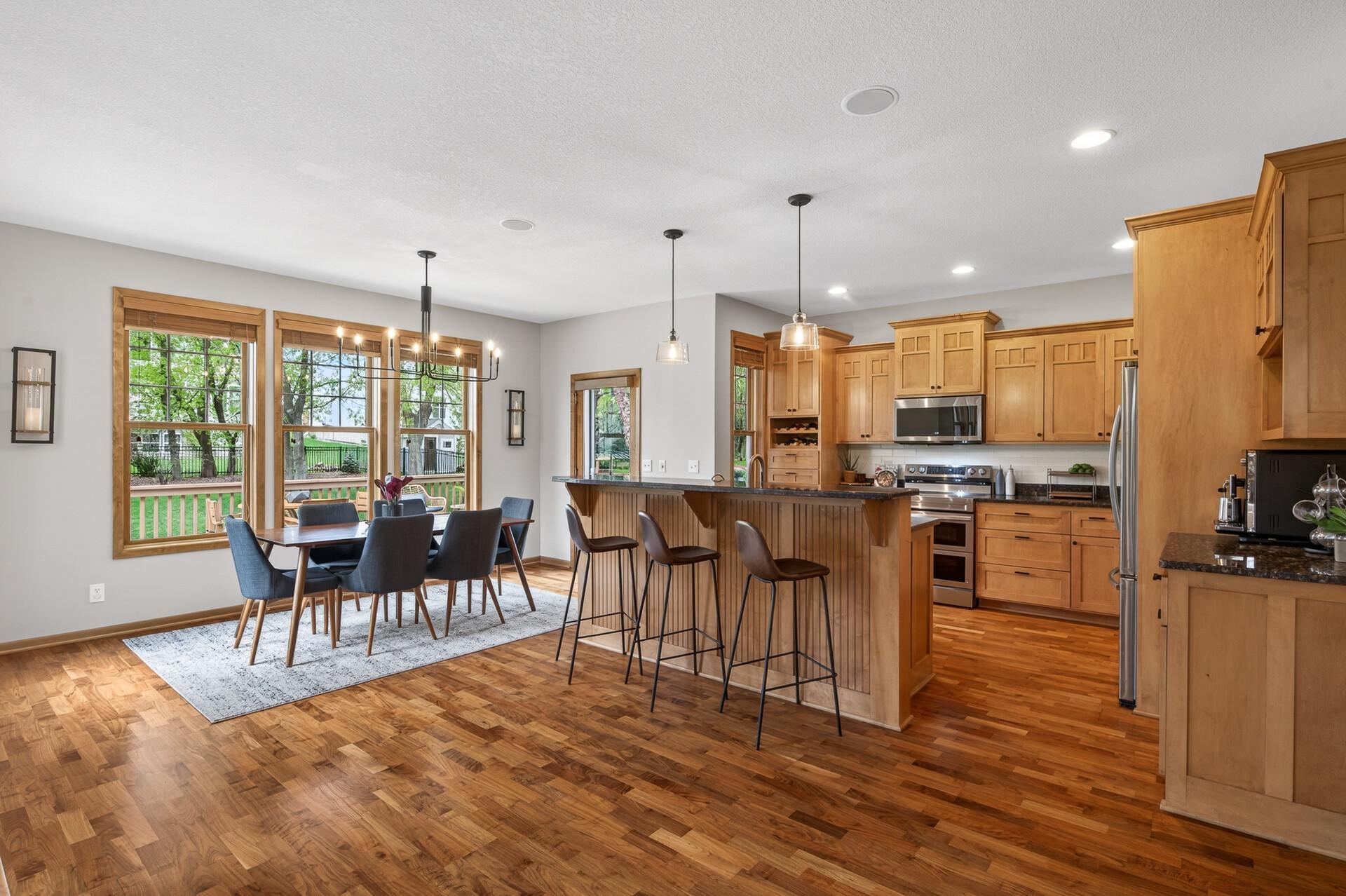 Dining space positioned to enjoy backyard views and easy indoor-outdoor flow.