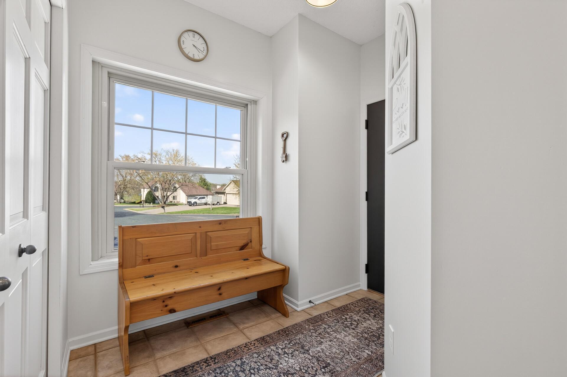 Mudroom Entry from Garage with bench & a large closet