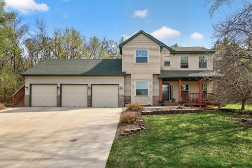 Another photo of the front, nice porch, concrete driveway