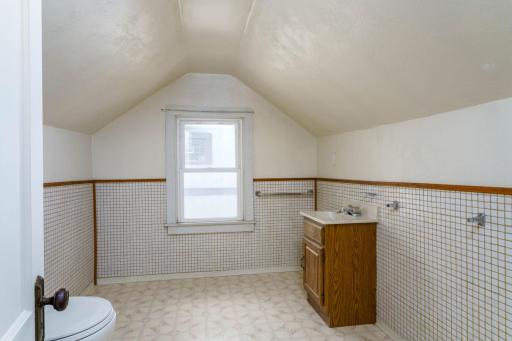 This space offers excellent potential to be transformed into a full bathroom with room for a tub and/or shower.