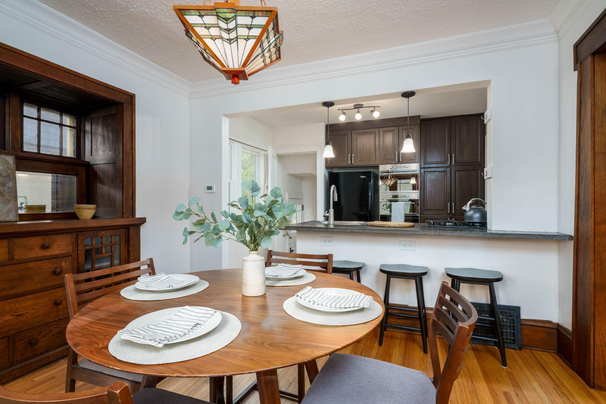 View of the dining room opening into the kitchen for maximizing your entertainment possibilities.