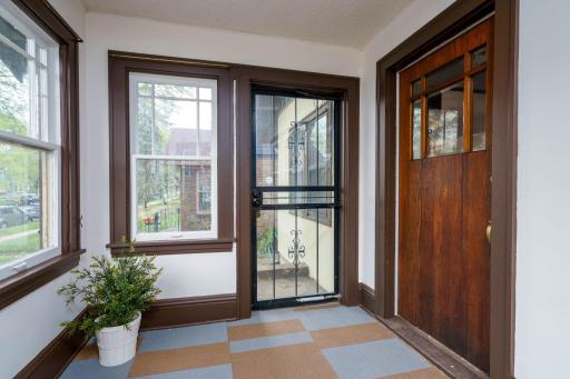 Welcome to this charming front porch offering a warm and inviting entry that sets the tone for the home.