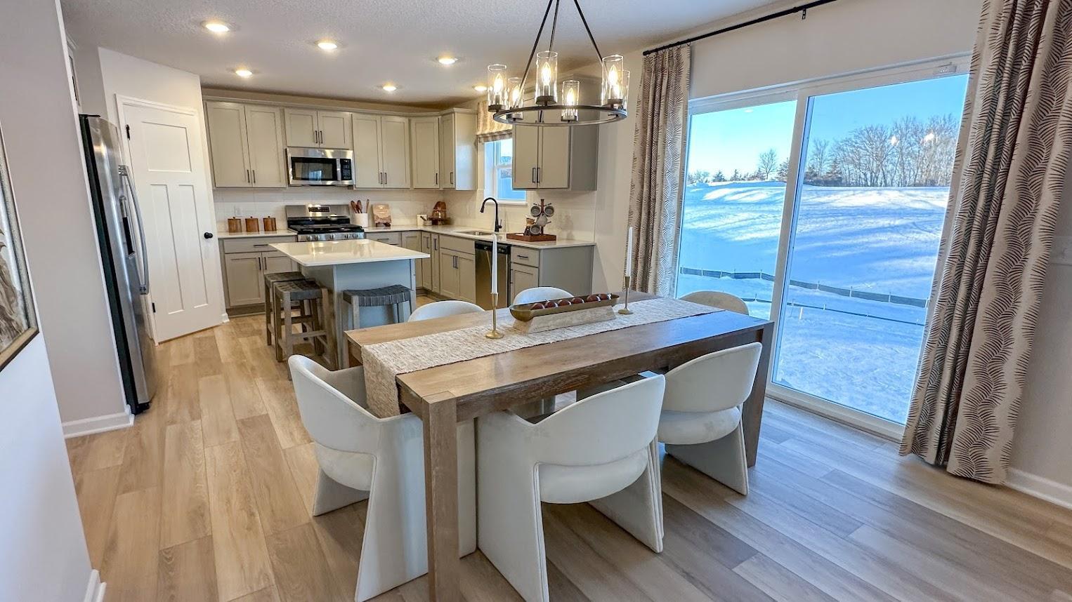 Waterbury Dining Area and Kitchen - Picture of Model Home
