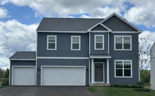 Gorgeous Waterbury plan with a 3-car garage on a walkout lot, providing added space and endless possibilities for future lower-level living.