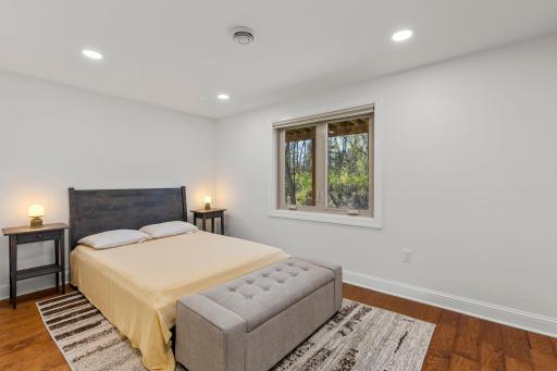 Second bedroom in the lower level with new hardwood floors and recessed lighting!